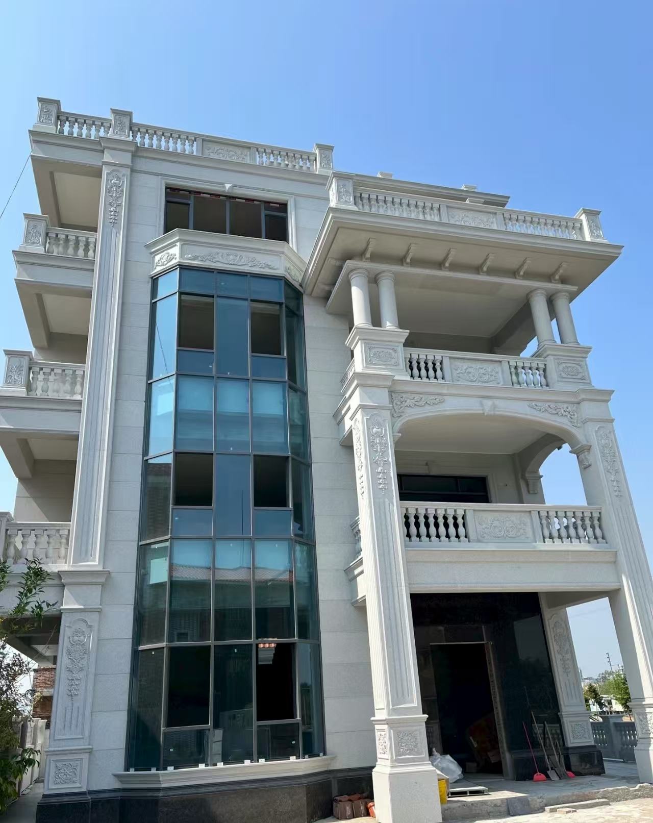 白山 芝麻白花岗岩别墅外墙干挂效果展示